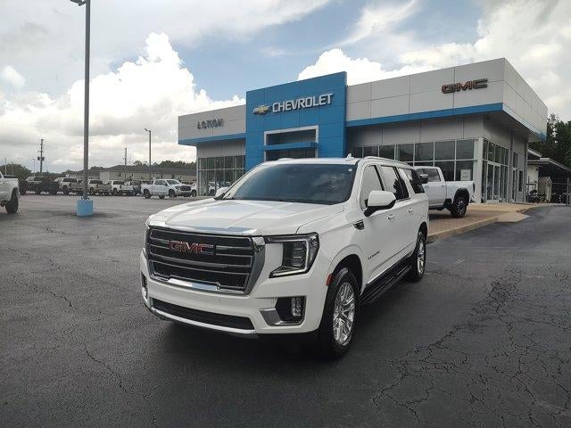 2023 GMC Yukon XL SLT in Summit White — front three-quarter view