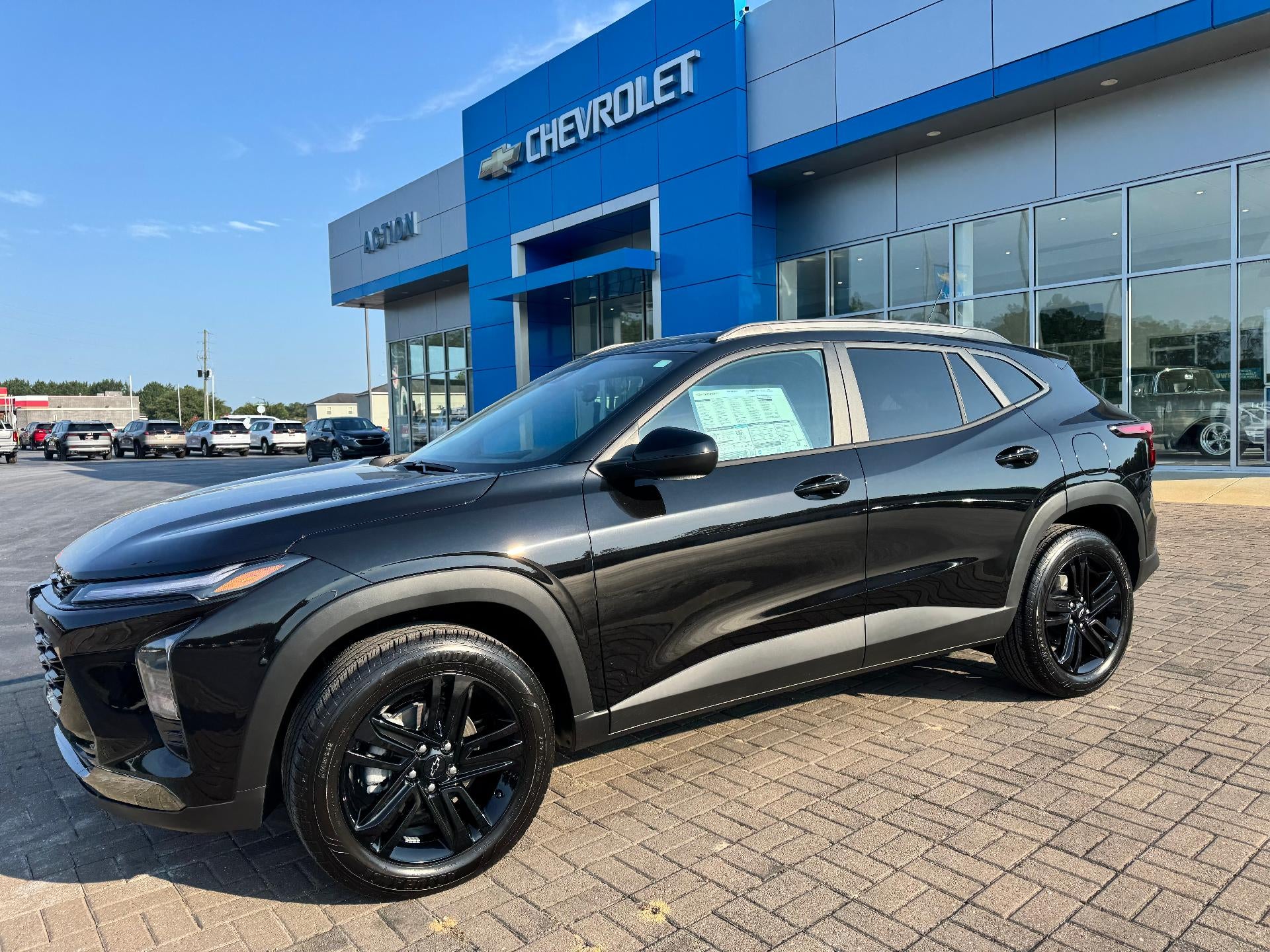 2026 Chevrolet Trax ACTIV in Mosaic Black Metallic — front three-quarter view